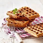 Pizza waffles with ham and dried tomatoes