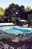 Rock garden by the pool in the garden