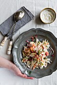 Fennel coleslaw on a silver plate