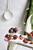 Chocolate covered strawberries on sticks