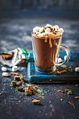 Hot chocolate with caramel sauce and marshmallows