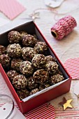 Dates and almond truffles, no sugar, cup of coffee, Christmas decorations