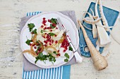 An autumn salad with parsnips, pomegranate and salted lemons