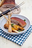 Confit parsnips with crackling