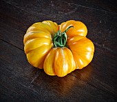 A yellow banana tomato