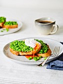 Peas on toast and topped with an egg