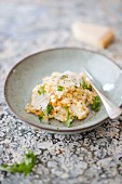Risotto with white asparagus, grated carrot and black salsify