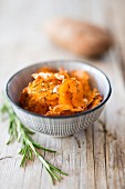 Oven-baked sweet potato crisps with rosemary and sea salt
