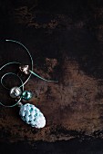 Turquoise pine cone Christmas tree bauble