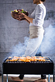 Satay skewers being grilled