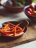 Caramelized carrots in bowl