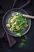 Vegan gnocchi with chard, peas and dill