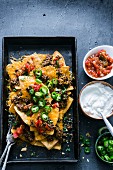 Chili nachos with cheese and jalapenos