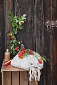 Tincture of rowan for relieving colds on wooden crate