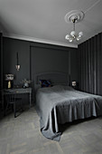Schlafzimmer ganz in Grau und Schwarz