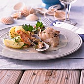 Fish and mussels with potatoes