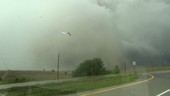 Stormchasers with tornado and damage