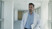 Doctor walking in a corridor