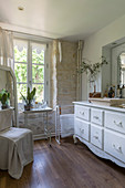 Antique white washstand in bathroom