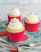 Cupcakes with buttercream and sugar roses