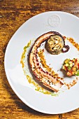 Grilled octopus at the restaurant 'Assirto', Moneglia, Liguria, Italy