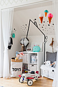 White wall decorated with black washi tape in boy's bedroom