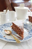 A slice of chocolate cake and coffee