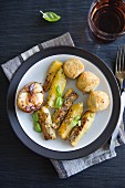 Fried courgette with potato croquettes