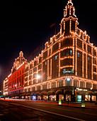 Harrods department store at night, London, UK
