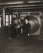 Tesla demonstrating his transformer