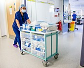 Surgical staff in a hospital corridor