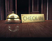 Hotel bell and sign on counter, illustration