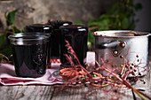 Homemade elderberry jelly in glass jars
