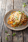 Vegetable spaghetti with grilled halloumi