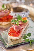 Canapes with tuna and tomato jelly