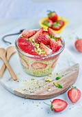 Chia pudding with strawberries, mint and pistachios