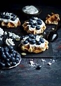 Waffles with blueberries, cream and meringue