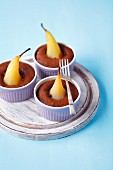 Pears baked into mini chocolate cakes