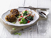 Curry meatballs with a coconut medley
