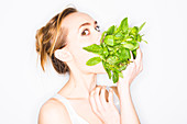 Woman smelling mint