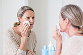 Woman using a make-up remover