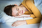 Woman sleeping in bed