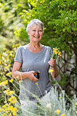 Woman picking flowers