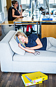 Woman taking a nap in the office