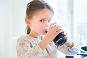 Girl drinking soft drink