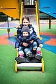 Children on a slide