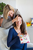 Woman receiving a gift