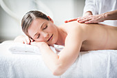 Woman receiving a back massage