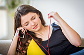 Teenager listening to music