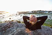 Woman watching sunset